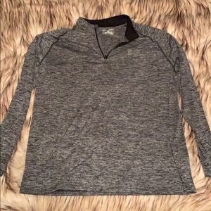 Under armor heat gear long sleeve zip neck.